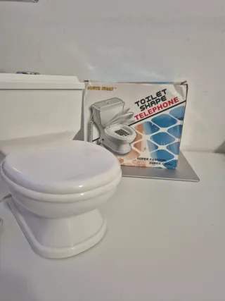 Telefono fisso a forma di water nuovo