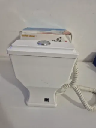 Telefono fisso a forma di water nuovo