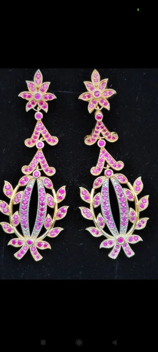 Pendientes largos oro y plata con rubi,pesan10,87g