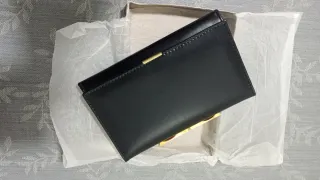 Cartera de piel negra para señora