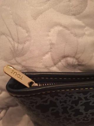 Bolsito de mano de tous de piel