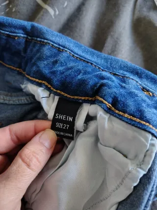 Jeans vita alta con borchie