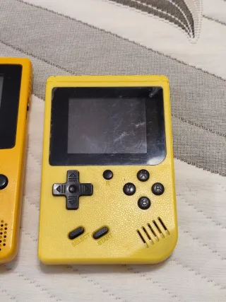 Dos consolas amarillas Funcionando OK