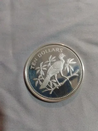 Moneta d'argento Belice 10 Dollari con uccello su ramo