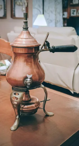 Antico alambicco in rame