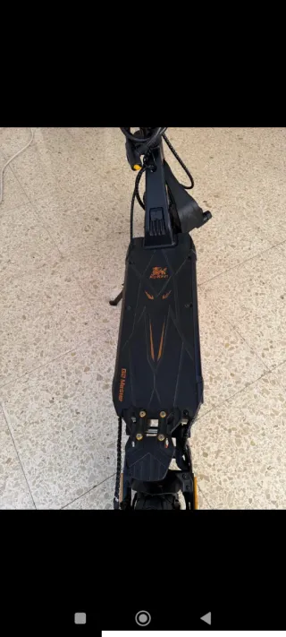 Patinete Eléctrico Negro y Naranja