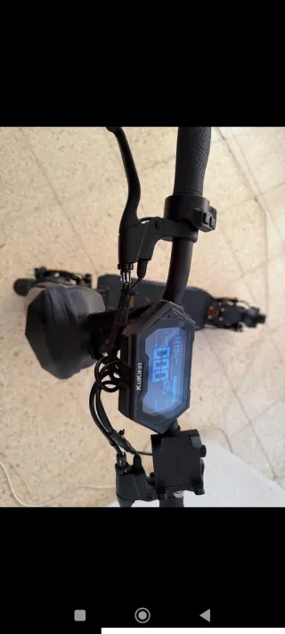 Patinete Eléctrico Negro y Naranja