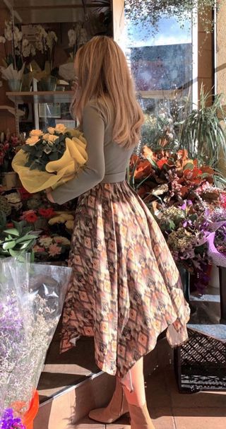 Vestido verde con estampado geométrico