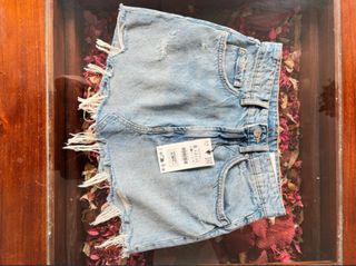 Falda vaquera desgastada talla S