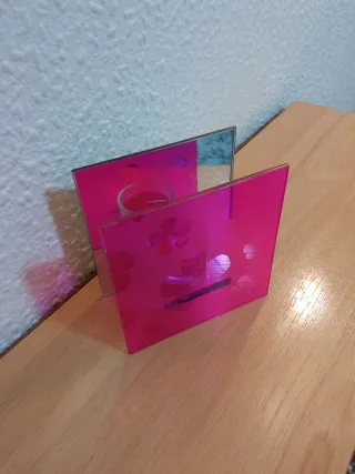 Portacandele rosa e trasparente