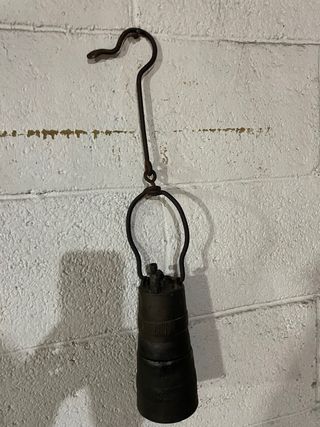 Lampada minatore antica di bronzo