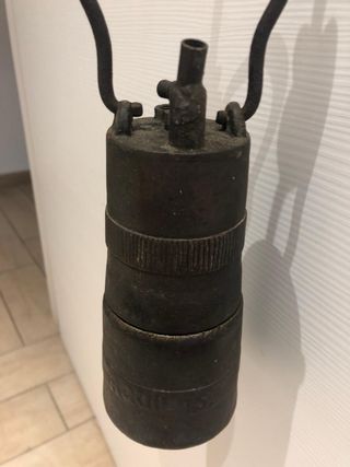 Lampada minatore antica di bronzo