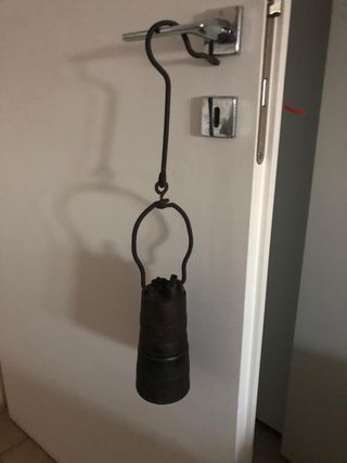 Lampada minatore antica di bronzo