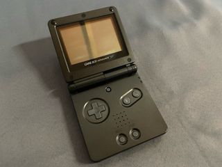 Pack Game Boy Advance SP + Mario & Luigi + Juego