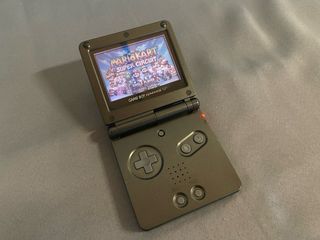 Pack Game Boy Advance SP + Mario & Luigi + Juego