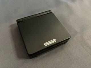 Pack Game Boy Advance SP + Mario & Luigi + Juego