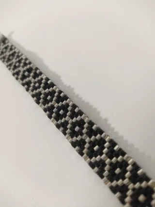 Pulsera Miyuki Negra y plateada.