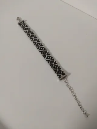 Pulsera Miyuki Negra y plateada.