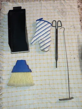 Estufa de leña marca Hergom con sus accesorios