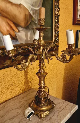 Candelabri in metallo dorati