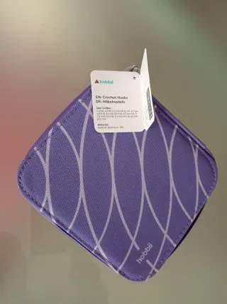 Set uncinetti viola con custodia