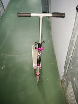 Patinete Oxelo rosa y negro