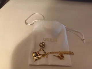 Pulsera Guess Corazón y Estrella Dorada