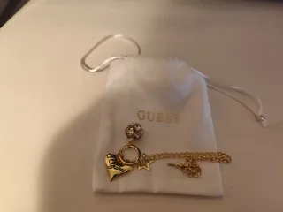 Pulsera Guess Corazón y Estrella Dorada