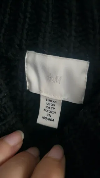 Jersey negro y blanco con flecos