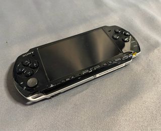 Sony PSP con juegos y accesorios