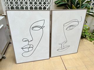 Set di 2 quadri minimalisti con volti.