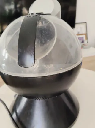 Cafetera Dolce Gusto Negra y Plateada