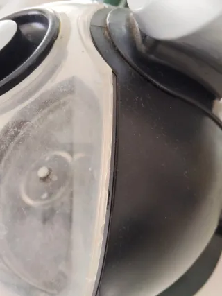 Cafetera Dolce Gusto Negra y Plateada