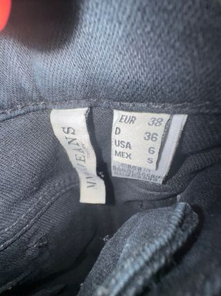 Vaqueros negros Mango