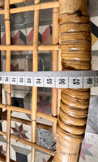 Cuna de mimbre vintage con ruedas