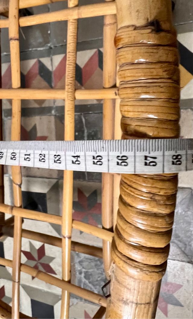 Cuna de mimbre vintage con ruedas