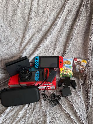 Nintendo Switch + Accesorios y Juegos
