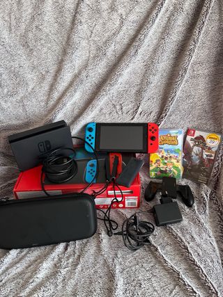 Nintendo Switch + Accesorios y Juegos