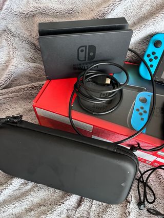 Nintendo Switch + Accesorios y Juegos