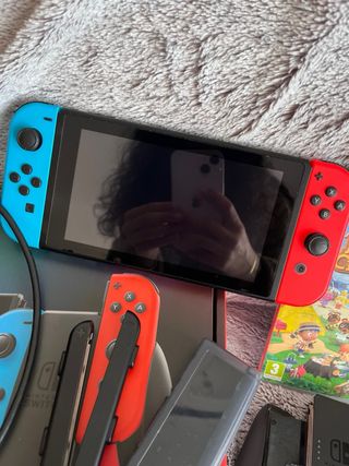Nintendo Switch + Accesorios y Juegos