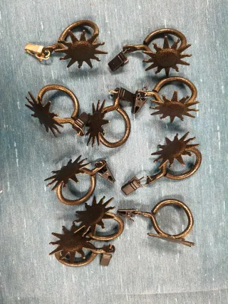 Gancio per tende e fermatende a forma di sole