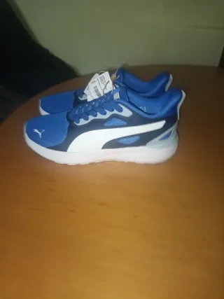 Zapatillas Puma niño azul y blanco
