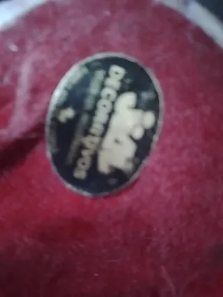 Muñeco multicolor con castañuelas