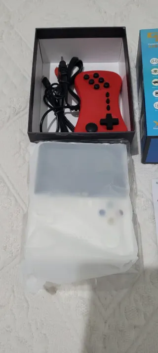 CONSOLA PORTATIL X9 EN SU CAJA CON ACCESORIOS.