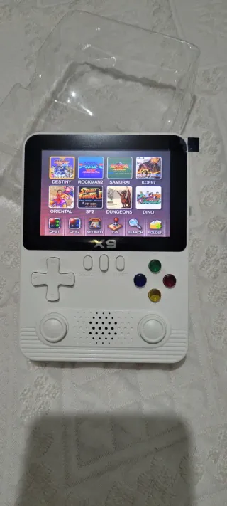 CONSOLA PORTATIL X9 EN SU CAJA CON ACCESORIOS.