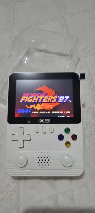 CONSOLA PORTATIL X9 EN SU CAJA CON ACCESORIOS.
