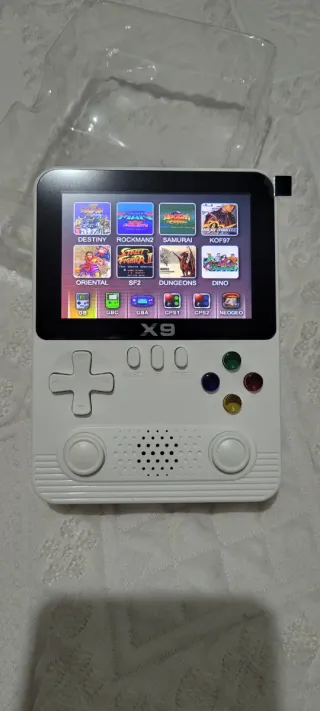 CONSOLA PORTATIL X9 EN SU CAJA CON ACCESORIOS.