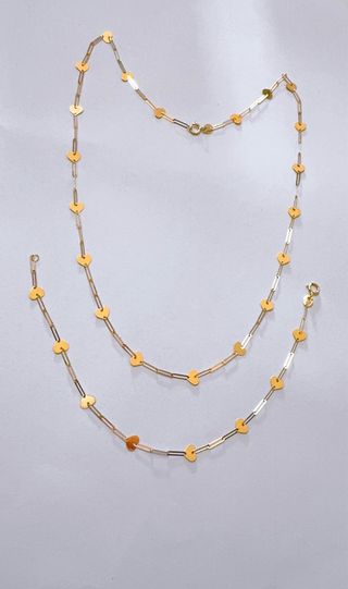 Set collana e bracciale a cuori in oro 18kt 750