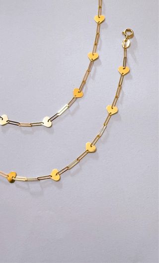 Set collana e bracciale a cuori in oro 18kt 750