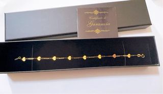 Set collana e bracciale a cuori in oro 18kt 750